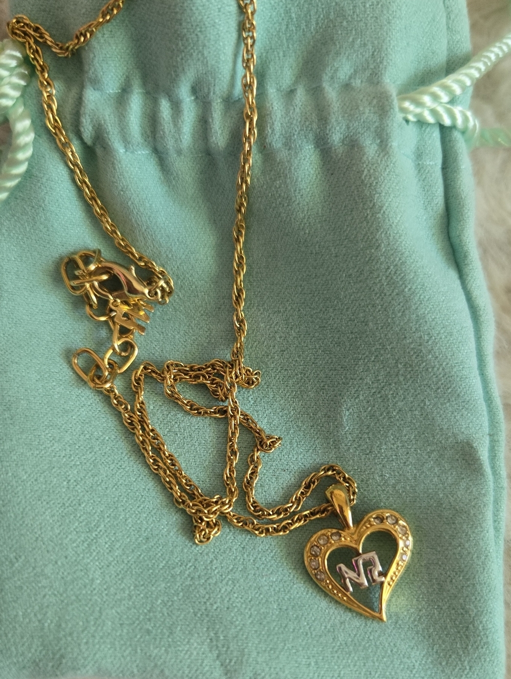 Nina Ricci Gold Heart Pendant Necklace with Clear Stones